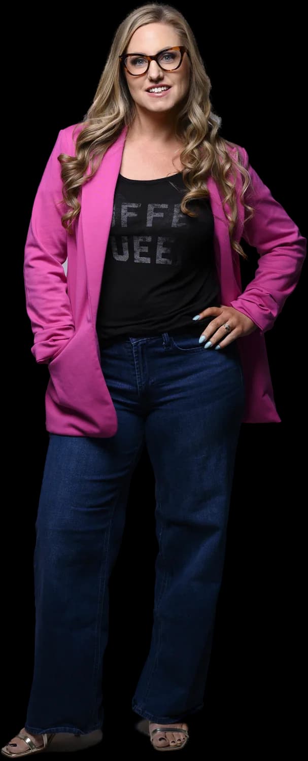 Jen, Meta and Facebook ads strategist for small business, standing confidently in a magenta blazer