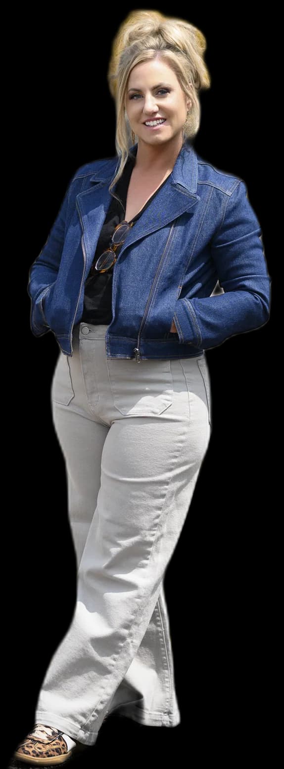 Jen, a social media coach, standing warmly in a denim jacket, ready to give you a real plan